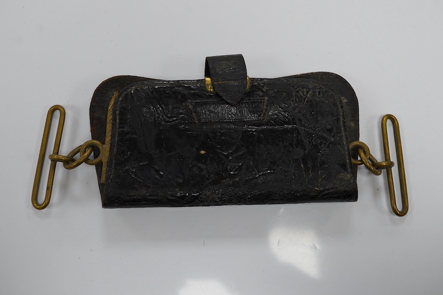 A Victorian Royal Artillery leather and brass cartridge pouch, 15cm wide. Condition - fair